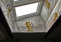 Airtightness materials at roof light on flat roof